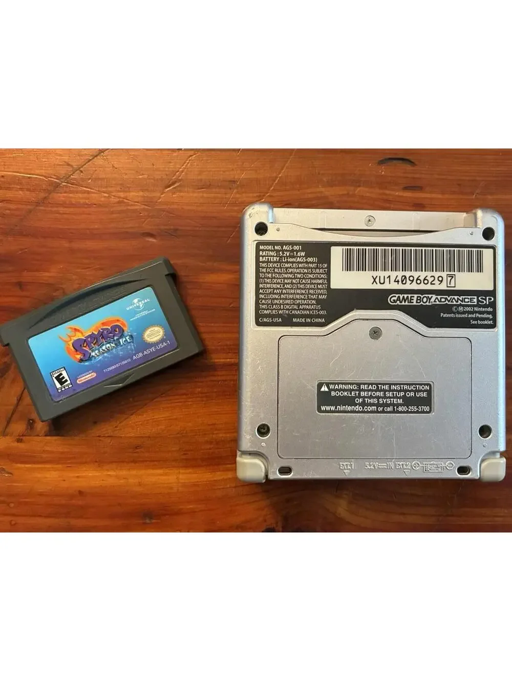 Nintendo Gameboy Game Boy Advance SP - AGS-001 with Spyro Skin + Spyro Game